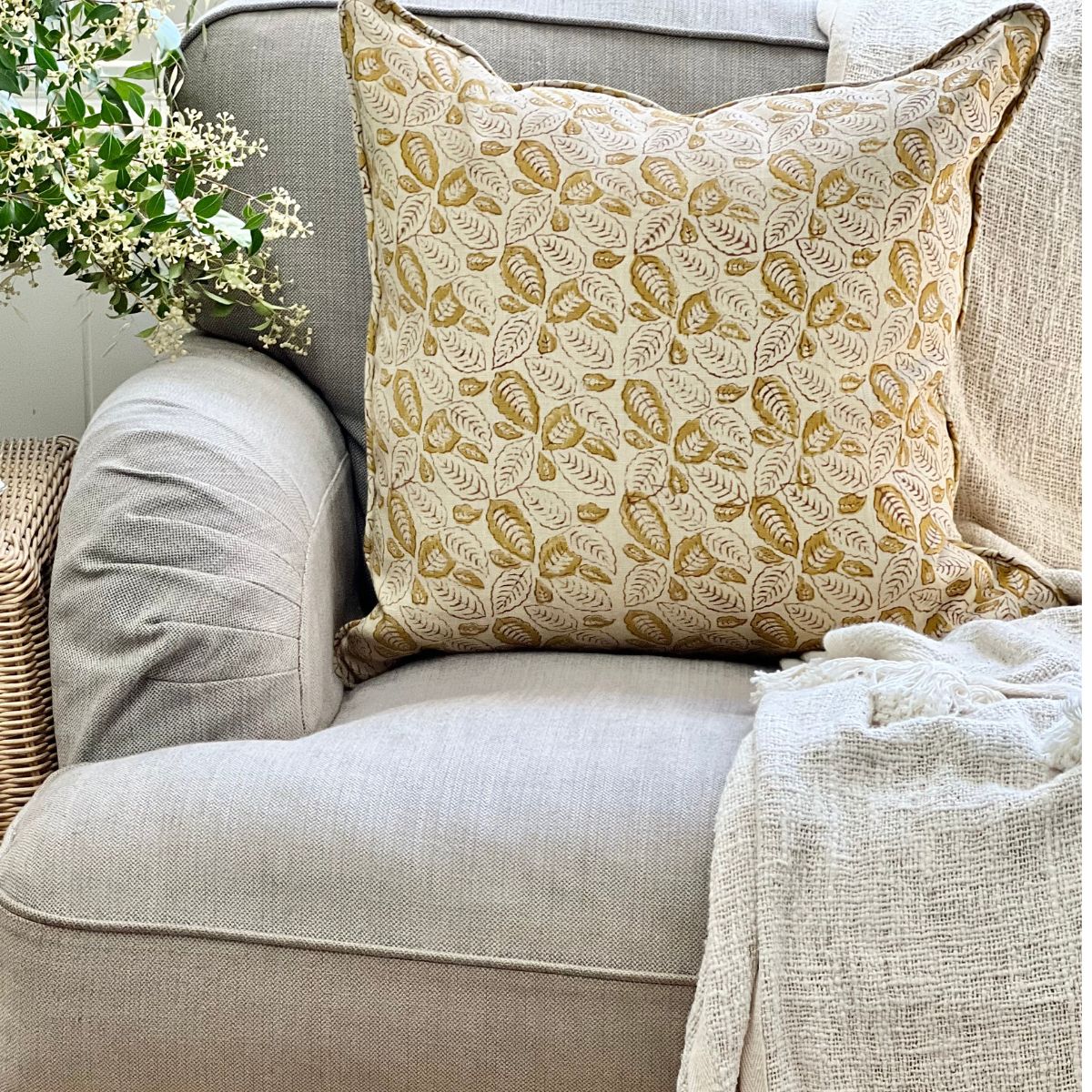 Mustard brown floral pattern hand block printed on pure linen cushion cover