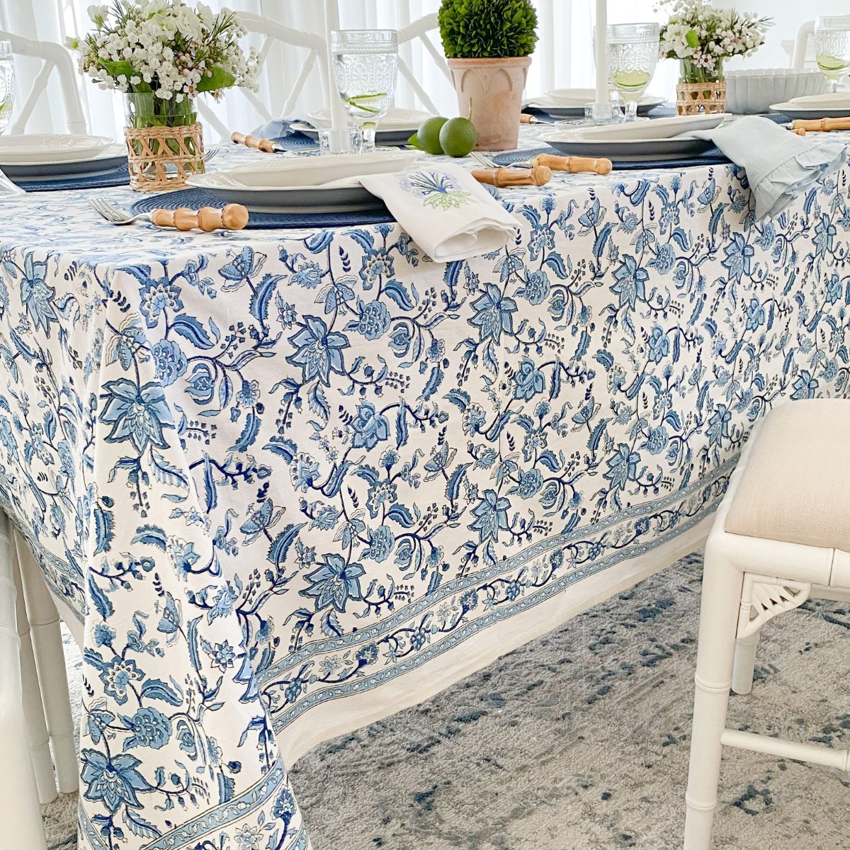 A 220 x 220 cm Chintz monochrome blue hand block printed square table linen for an 8 seater dining table, a bold everyday tablecover in rich blue floral block print on premium cotton.