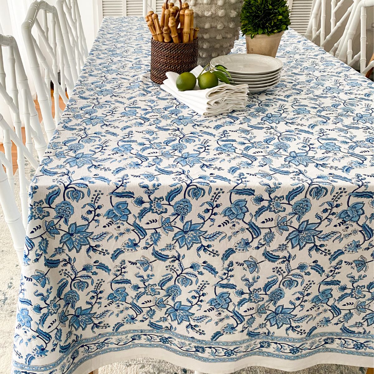 A 180 x 180 cm Chintz monochrome blue hand block printed cotton square tablecloth for a relaxed alfresco summer lunch, a versatile everyday dining linen for casual Australian outdoor entertaining.