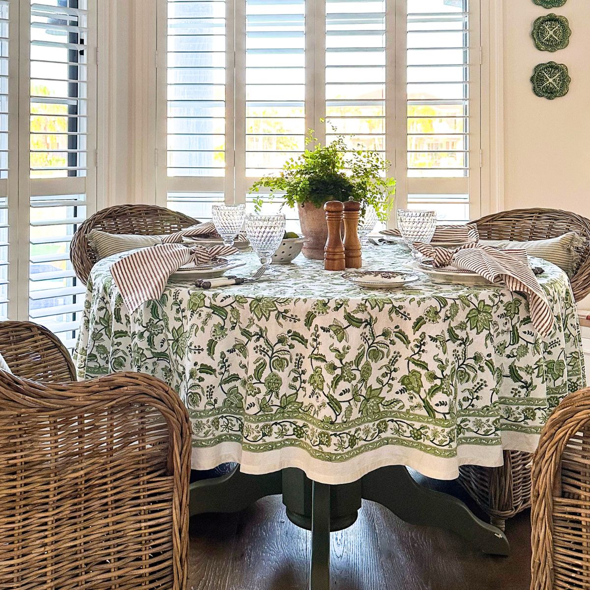 A 220 cm Chintz monochrome green hand block printed cotton round tablecloth for an 8 seater circular table, a fresh and cheery everyday dining linen perfect for relaxed spring and summer Australian entertaining.