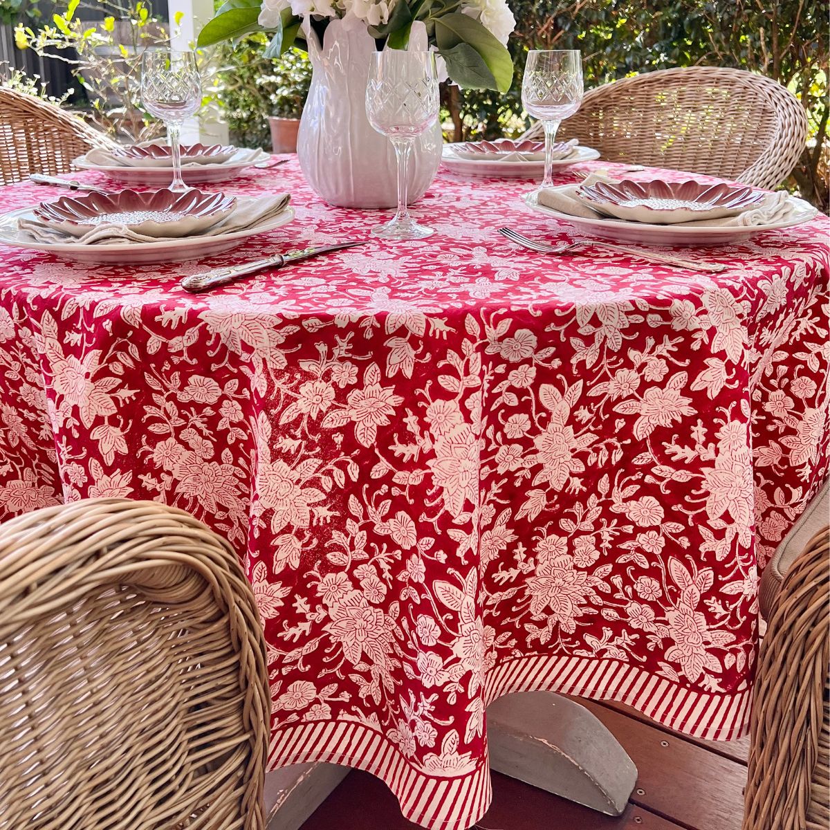 A 220 cm red and white floral hand block printed cotton round tablecloth for an 8 seater circular table, a versatile everyday dining linen for relaxed alfresco Australian entertaining.