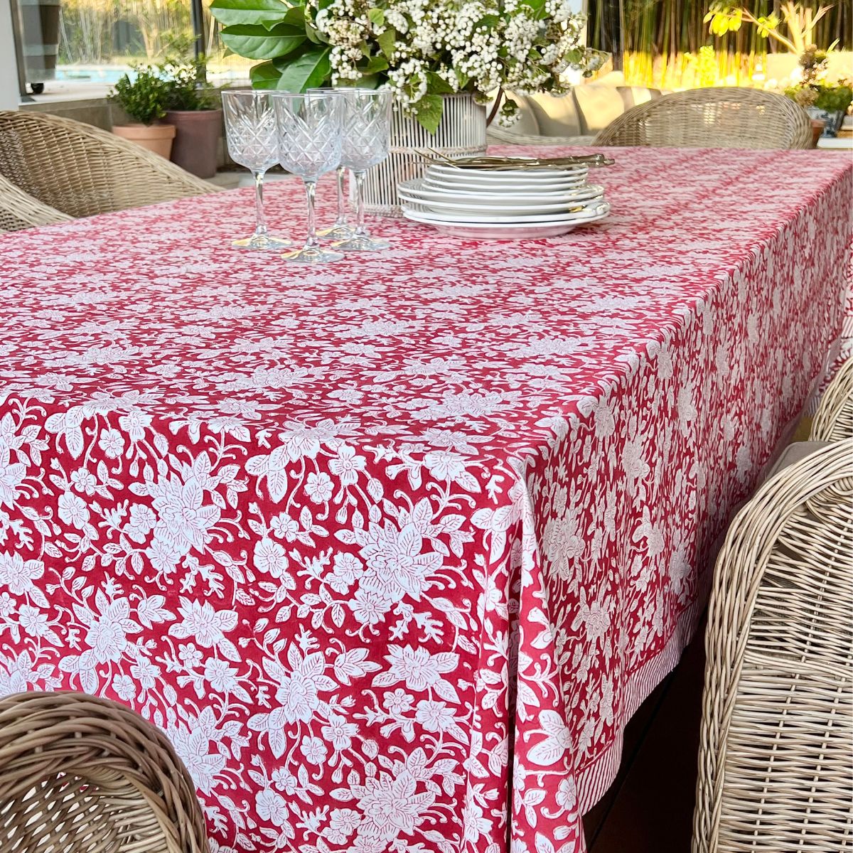 A 180 x 180 cm red and white floral hand block printed square table linen for a 6 seater dining table, a bold and versatile everyday tablecover for relaxed Australian dining.