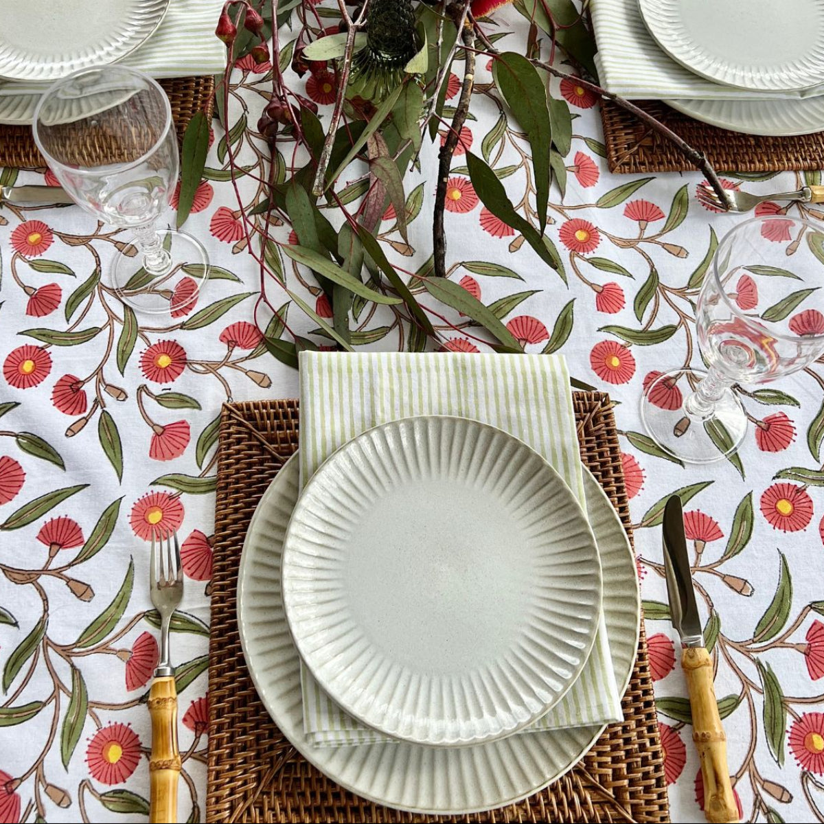 220 cm Red Flowering Gums square tablecloth styled for spring and summer entertaining with coordinated tableware.