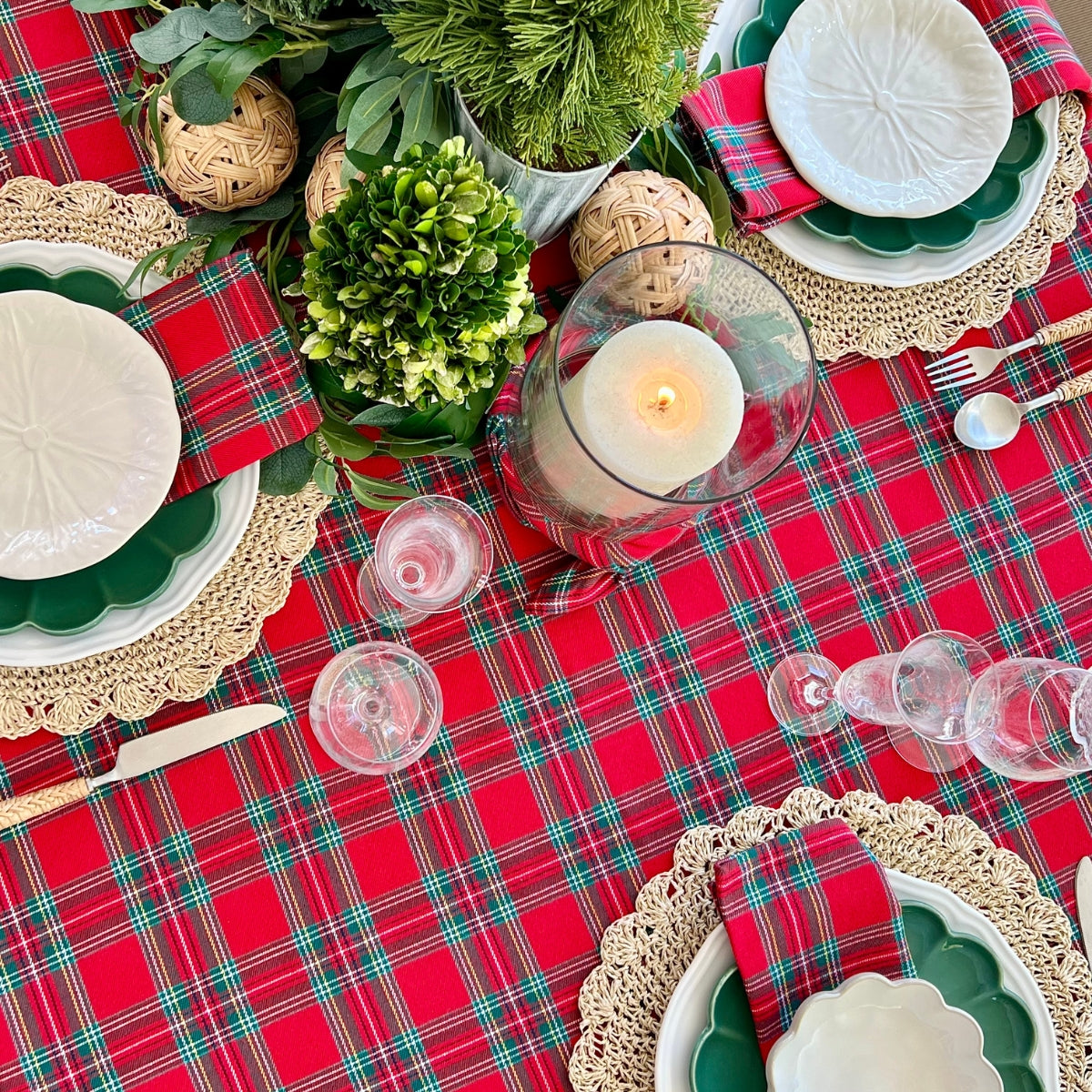 Red Green Tartan Handwoven tablecloth on large rectangular table in an alfreso setting