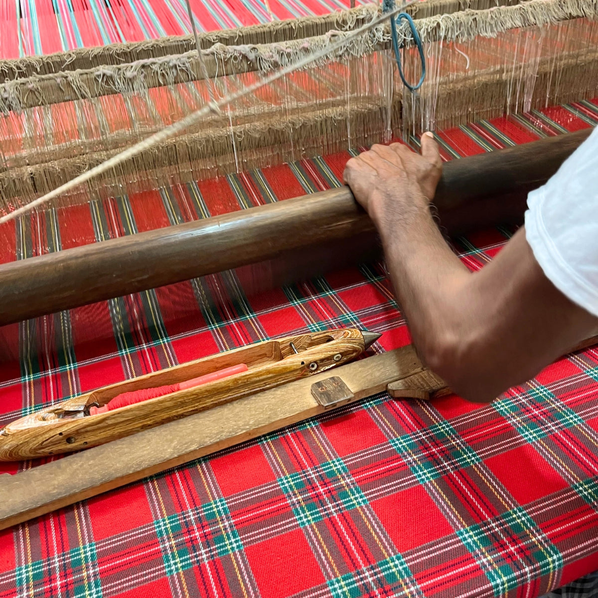 Closeup of Handloom weaving of Red Tartan Holiday Tablecloth