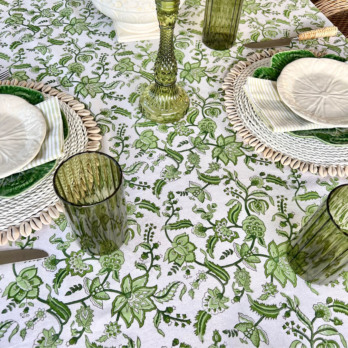 
A 220 x 220 cm Chintz monochrome green hand block printed cotton square tablecover for an 8 seater alfresco summer lunch, a versatile everyday dining linen for relaxed outdoor Australian entertaining.