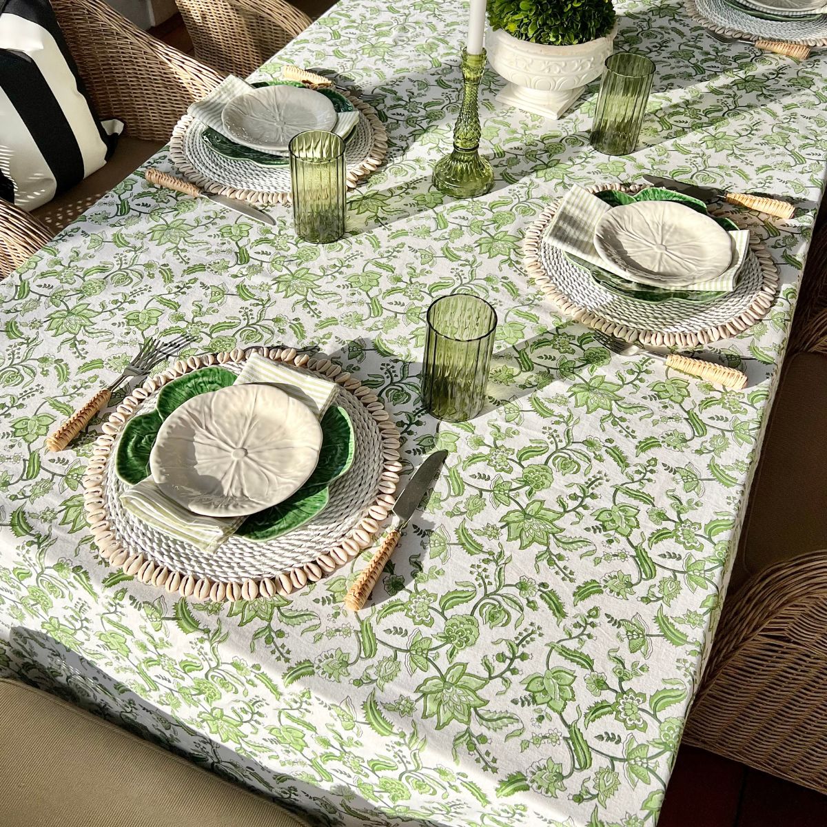 A 150 x 300 cm Chintz monochrome green hand block printed cotton tablecloth for a relaxed spring dining table, a bold everyday table linen in intricate green floral block print perfect for fresh seasonal entertaining.