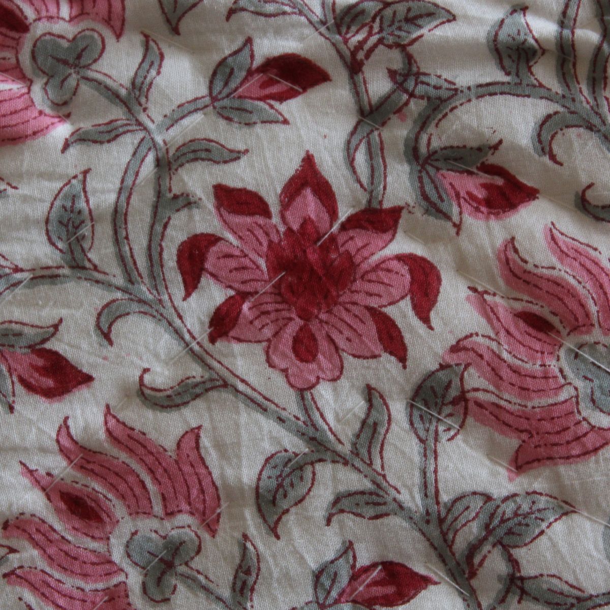 Pink red green Indian floral boota and jaal pattern hand block printed on reversible cotton quilt