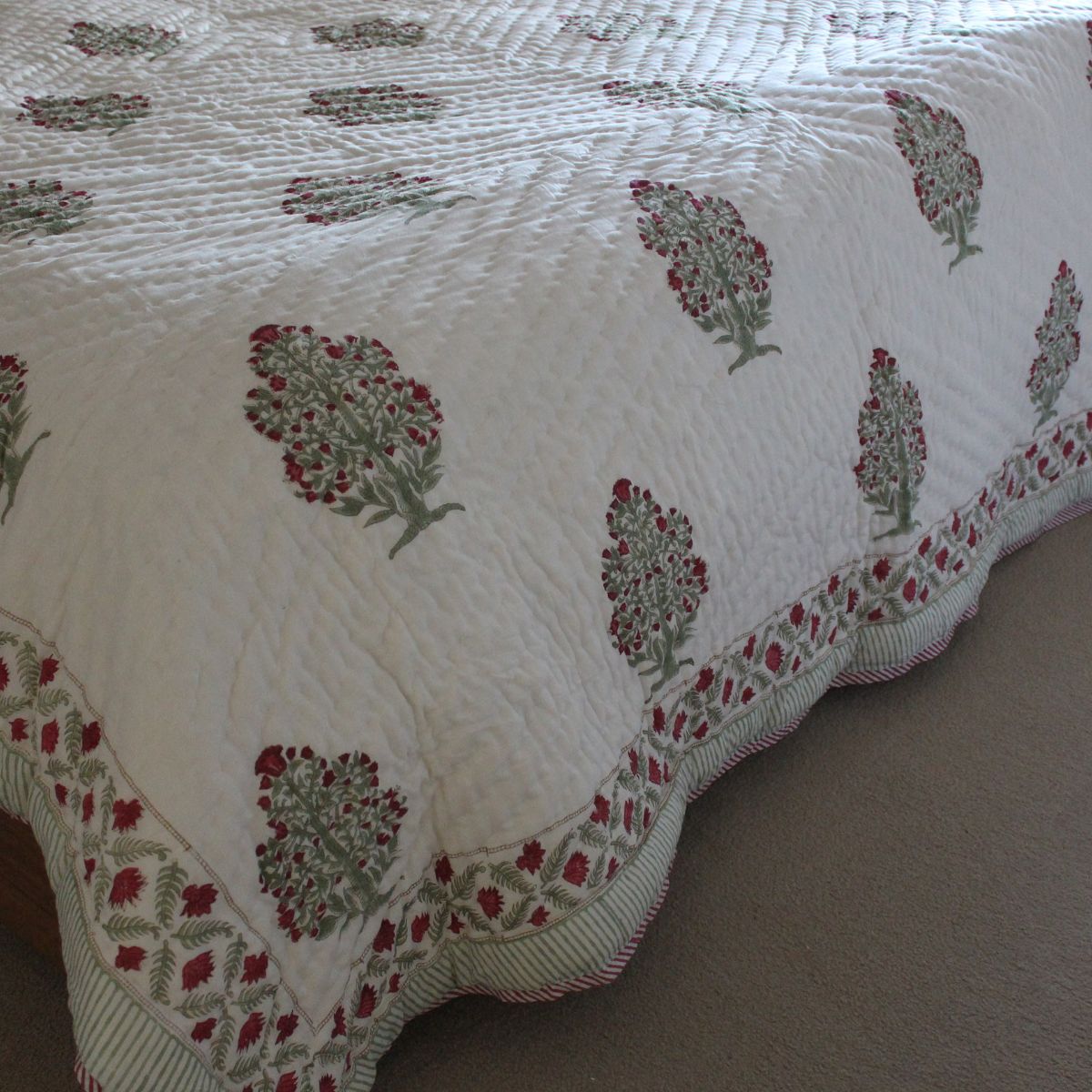 
Large-scale floral block print quilt featuring heritage-inspired botanical motifs and handcrafted cotton construction.