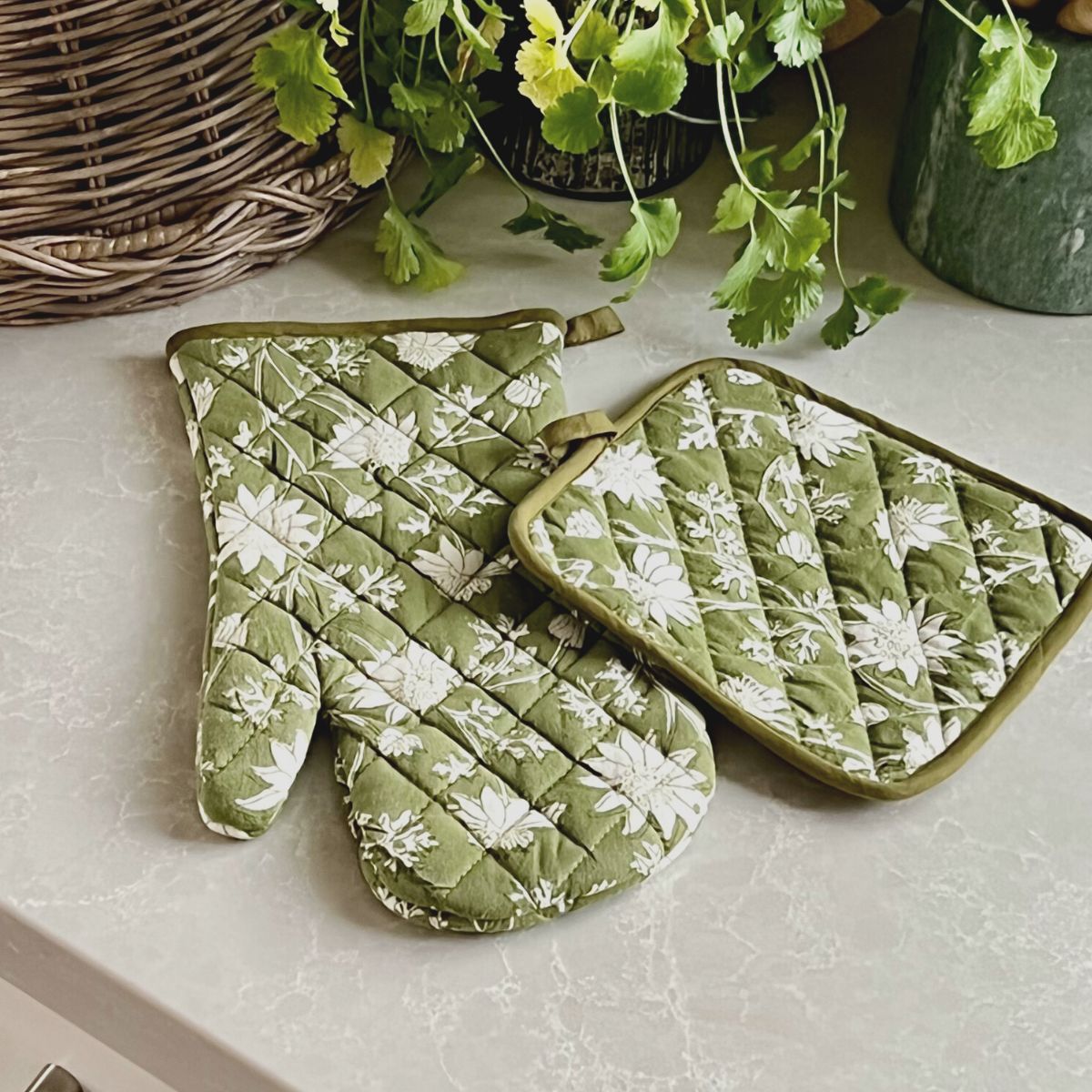 Hand block printed quilted pot holder on a neutral background, highlighting the Flannel Flowers pattern and artisan-made quality.