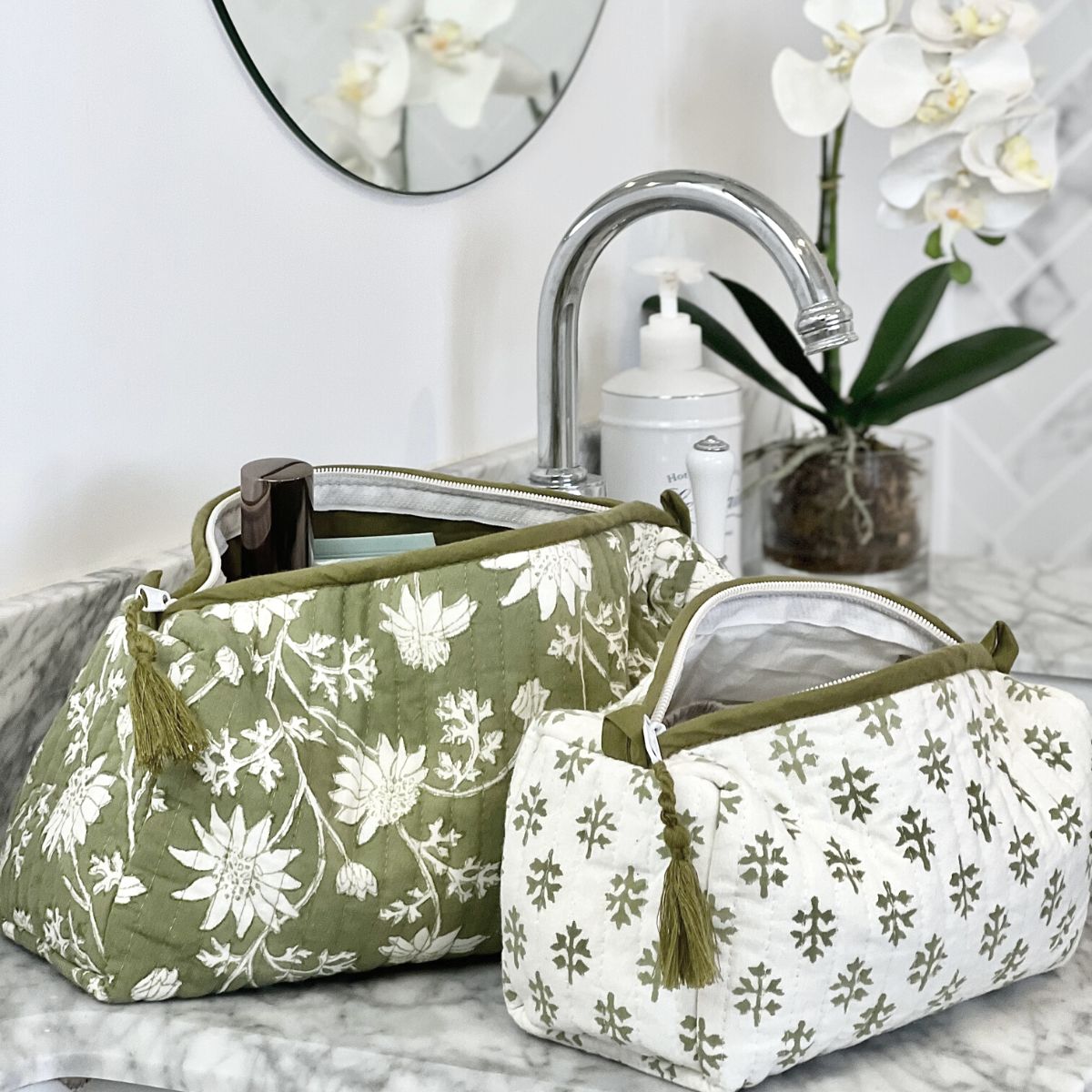 Flannel Flowers quilted wash bags styled in a bathroom setting, ideal for organizing cosmetics, toiletries, skincare essentials, and travel accessories.