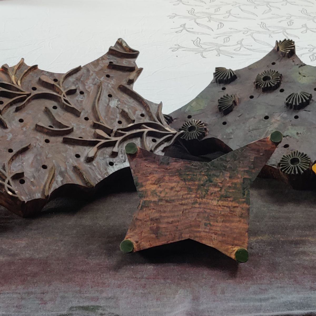 Hand-carved wooden printing block used to create the Red Flowering Gums round cotton tablecloth collection in 150 cm, 180 cm, and 220 cm sizes.