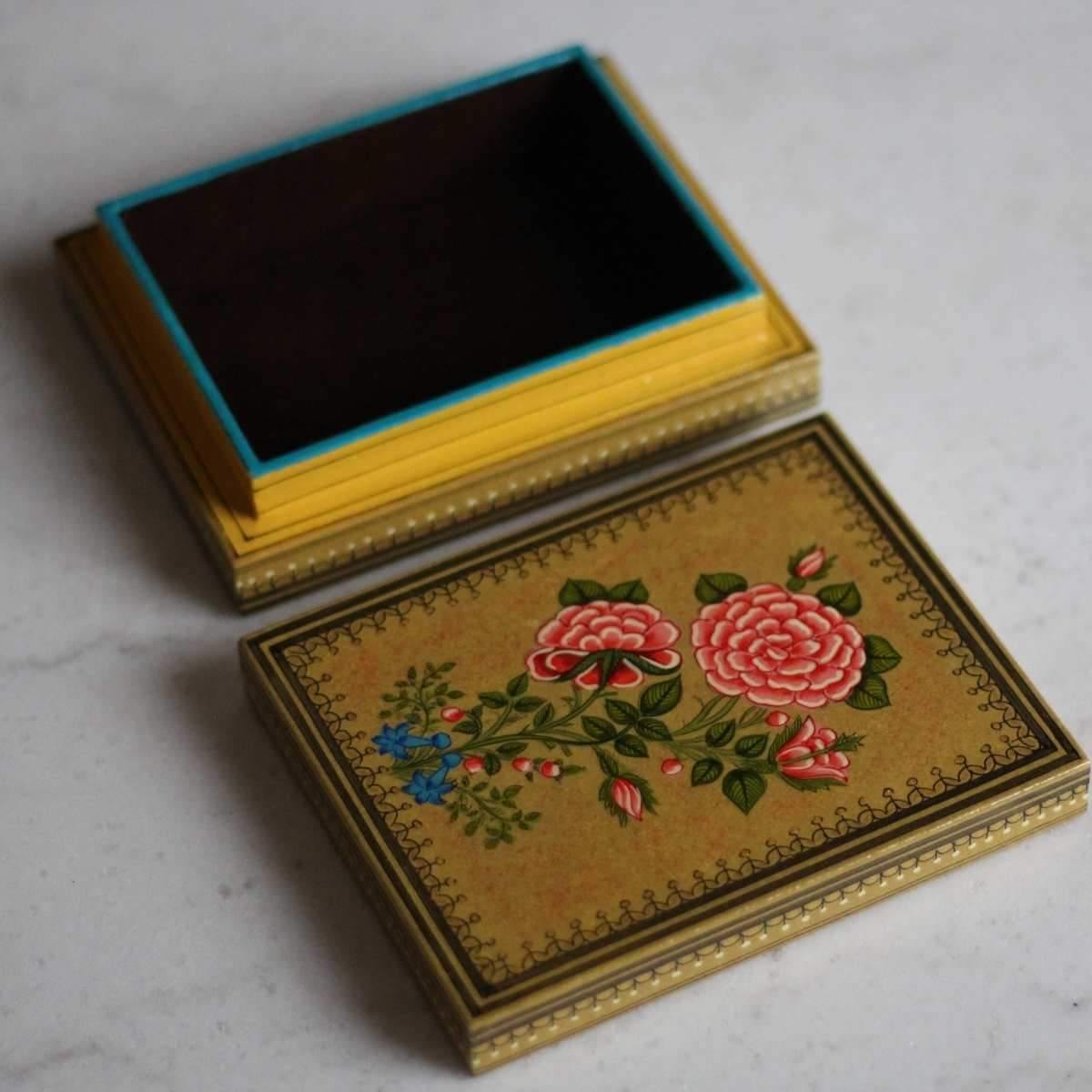 Decorative rose timber box featuring artisan artwork and versatile storage for keepsakes, stationery, and small accessories.