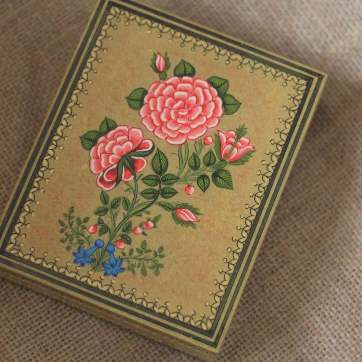 Hand-painted Rose wooden keepsake box featuring intricate floral artwork and practical storage for jewellery, photos, and treasured mementos.