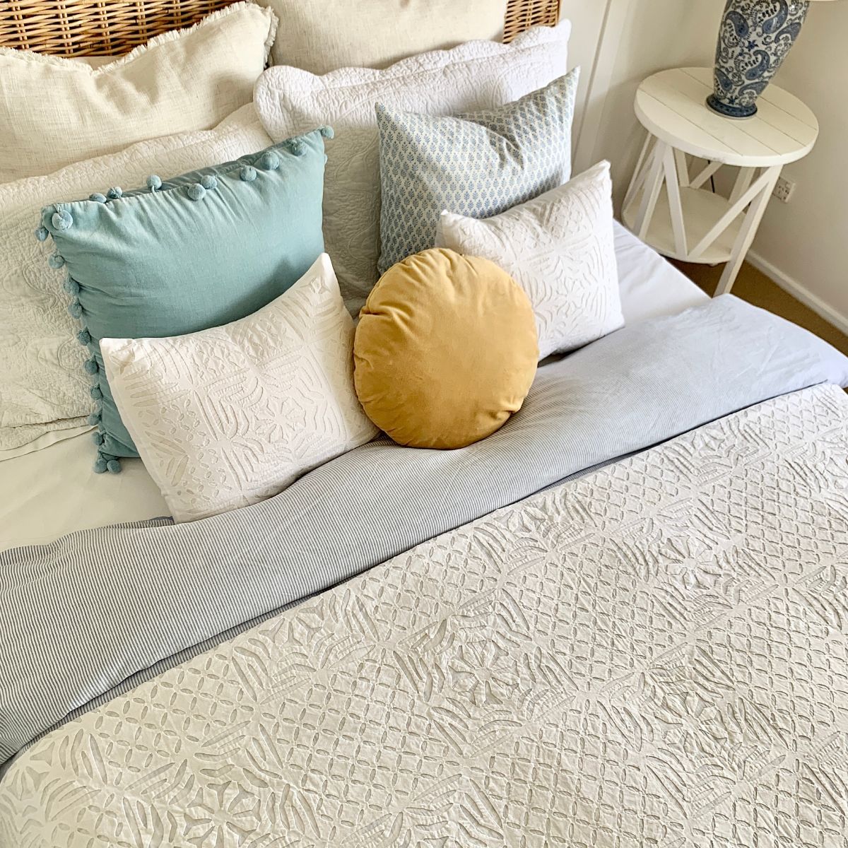 Applique white organdy cutwork cushion cover